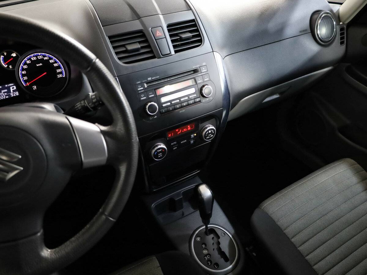 Suzuki SX4 с пробегом — 2011 год. Фото: #13