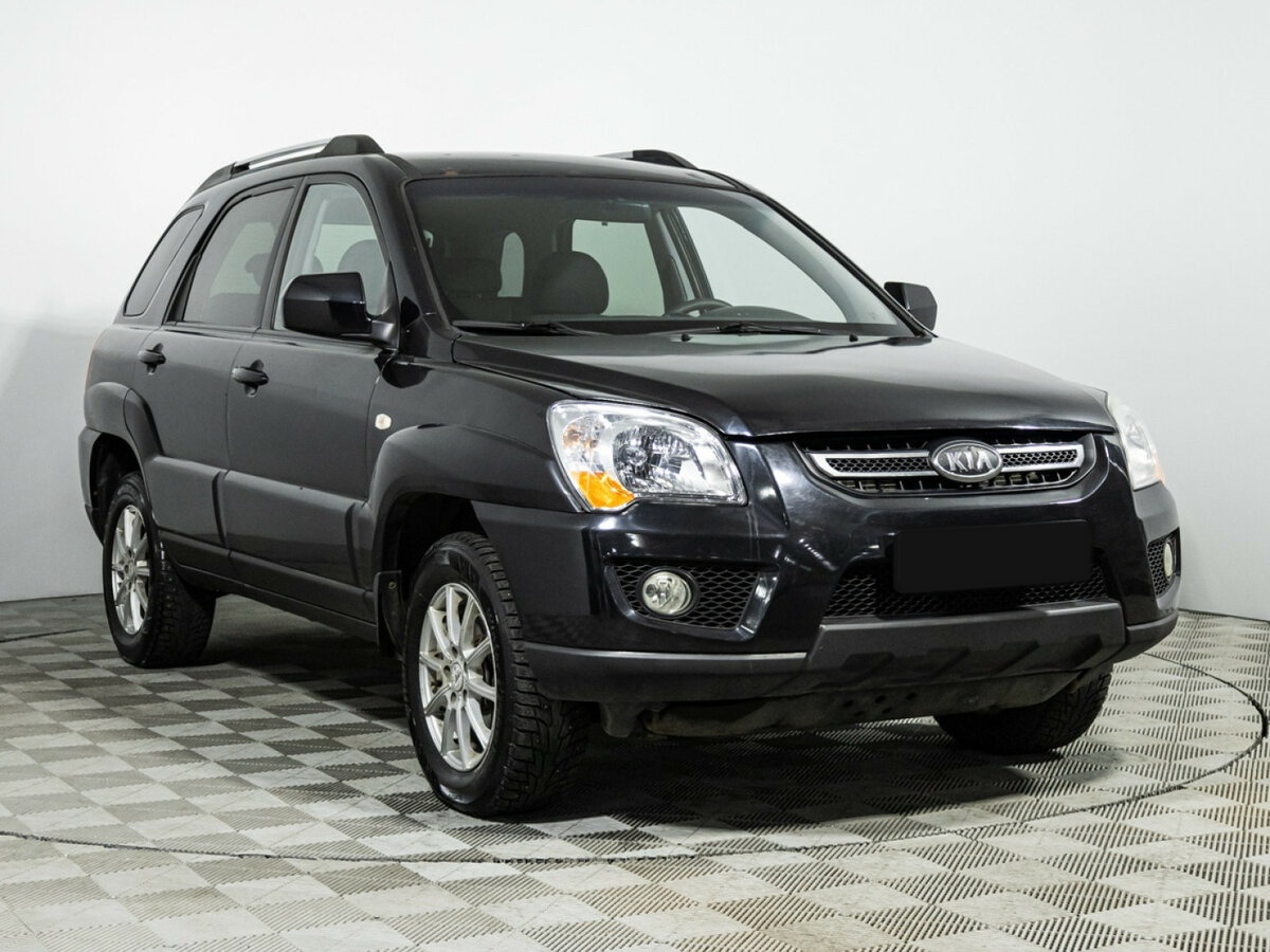 Kia Sportage с пробегом — 2010 год. Фото: #2
