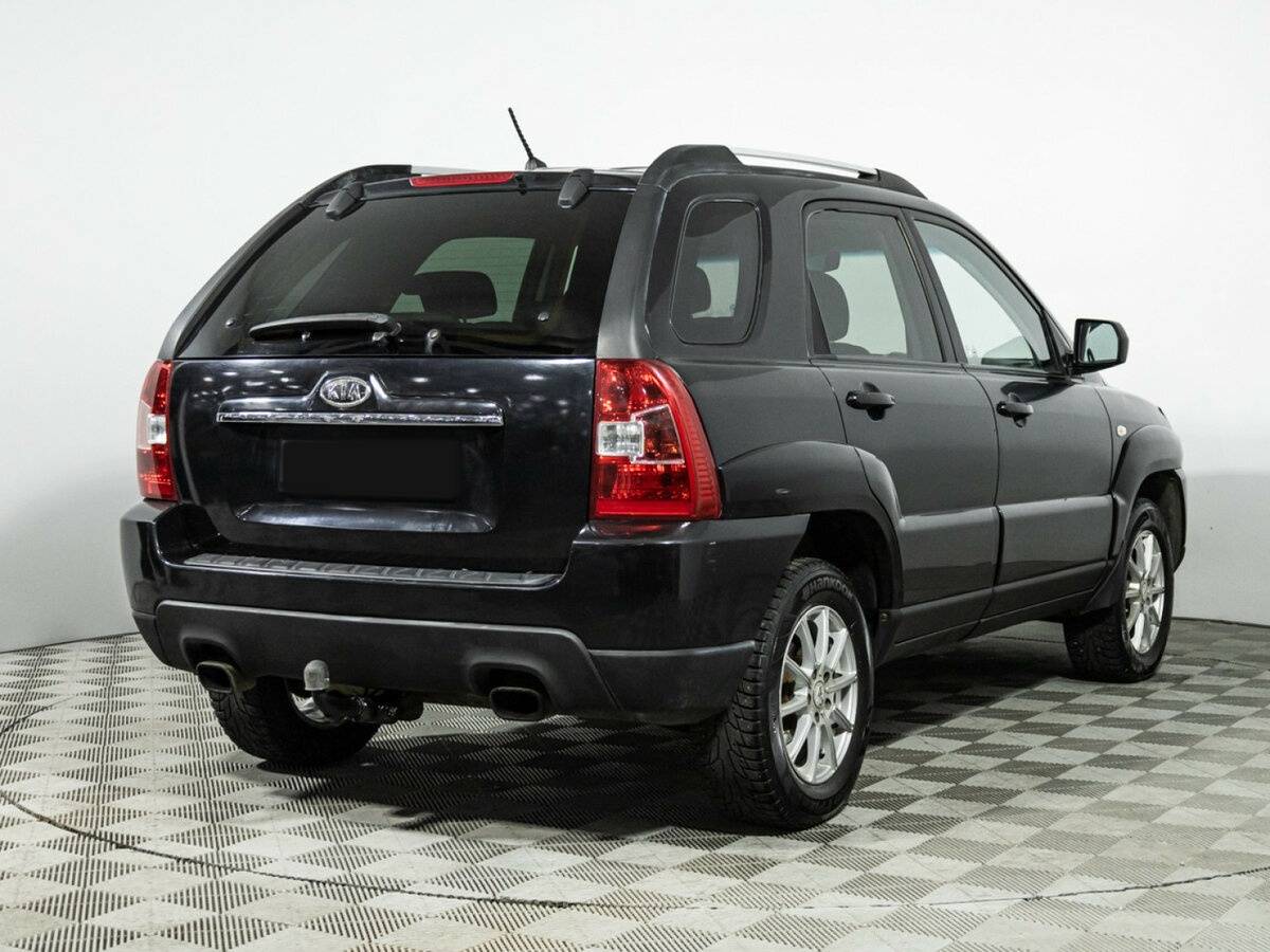 Kia Sportage с пробегом — 2010 год. Фото: #3