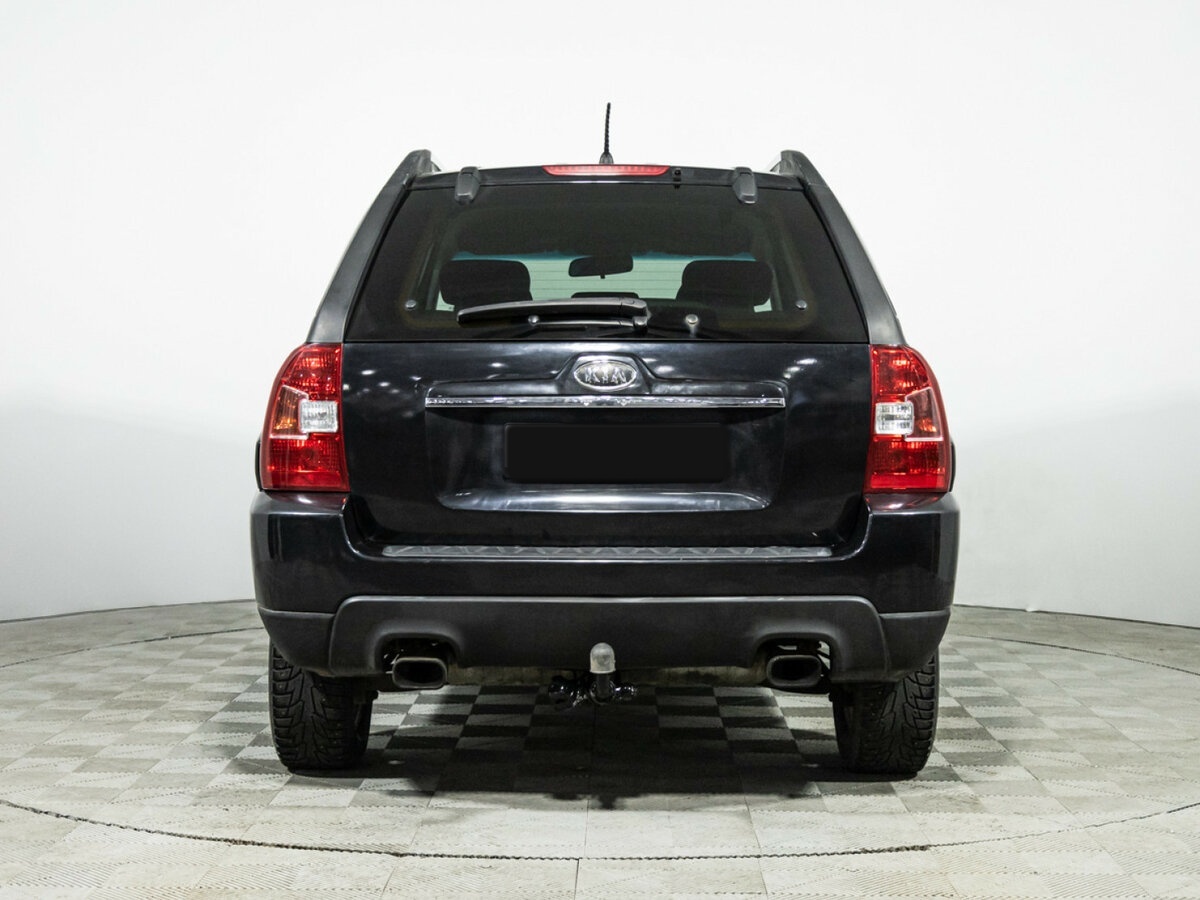Kia Sportage с пробегом — 2010 год. Фото: #4