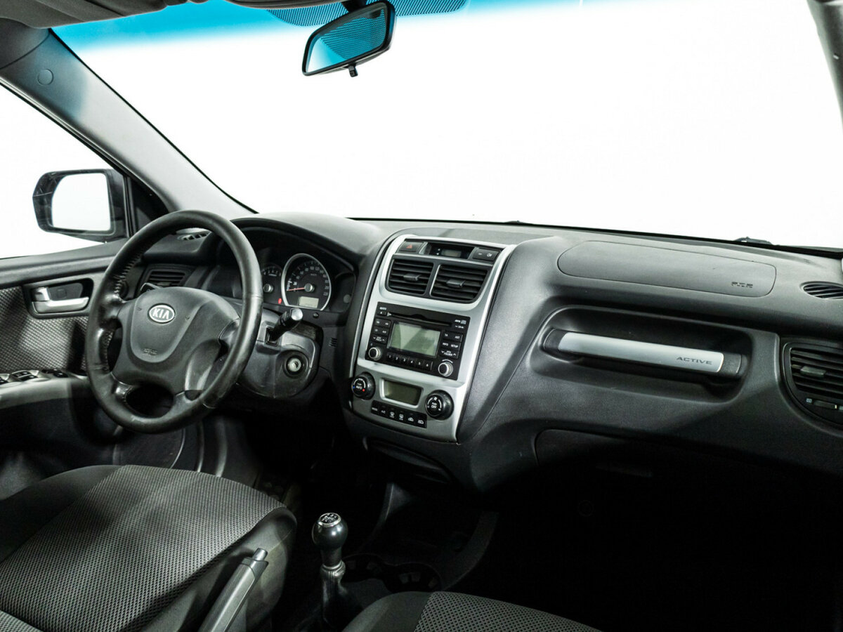 Kia Sportage с пробегом — 2010 год. Фото: #6