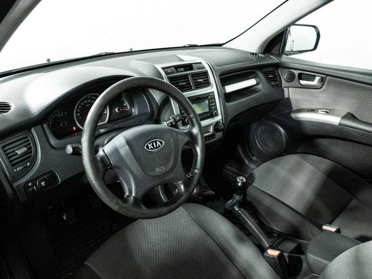 Kia Sportage с пробегом — 2010 год. Фото: #8