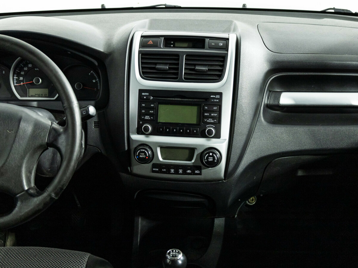 Kia Sportage с пробегом — 2010 год. Фото: #11