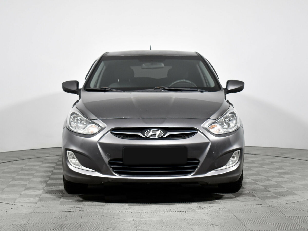 Hyundai Solaris с пробегом — 2011 год. Фото: #1