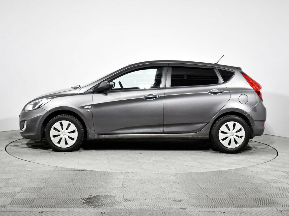 Hyundai Solaris с пробегом — 2011 год. Фото: #7