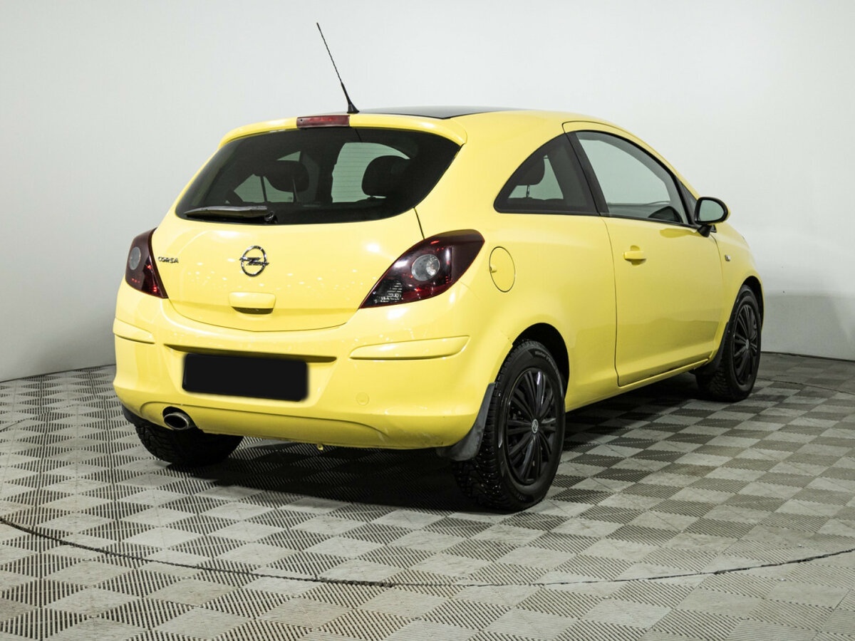 Opel Corsa с пробегом — 2011 год. Фото: #4