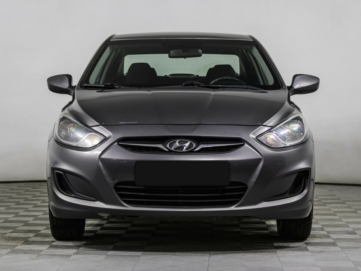 Hyundai Solaris с пробегом — 2011 год. Фото: #1