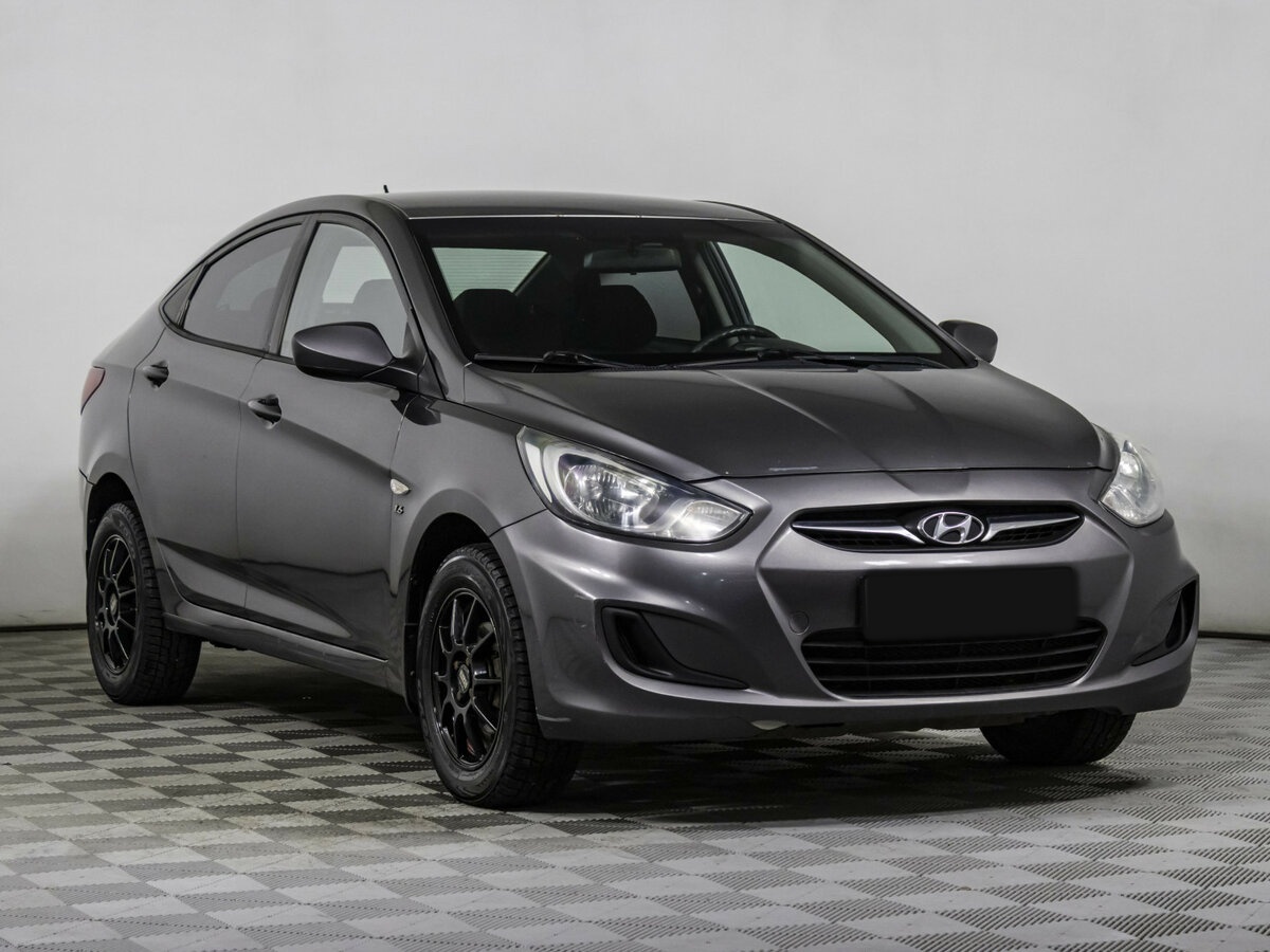 Hyundai Solaris с пробегом — 2011 год. Фото: #2