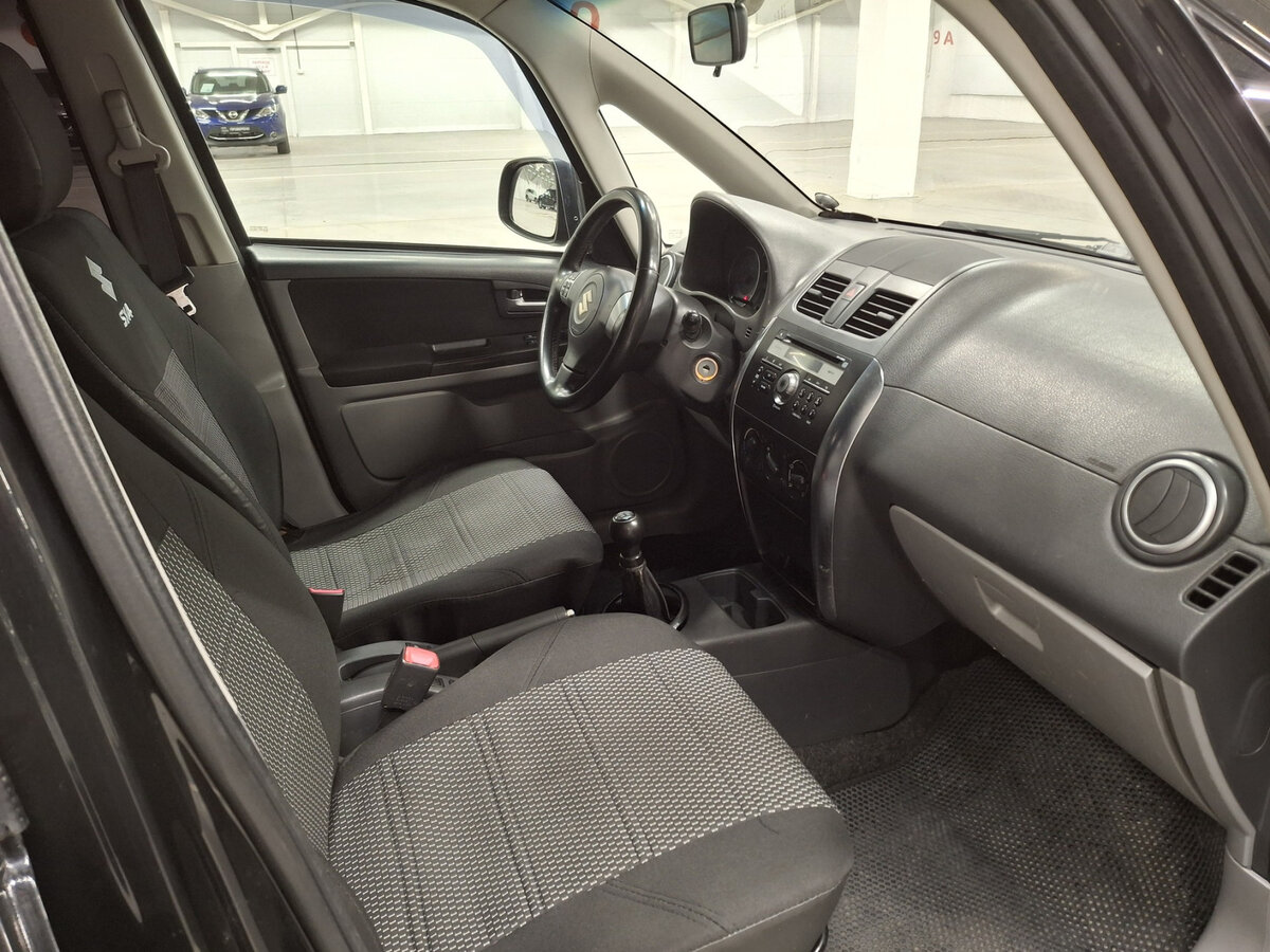 Suzuki SX4 с пробегом — 2012 год. Фото: #10