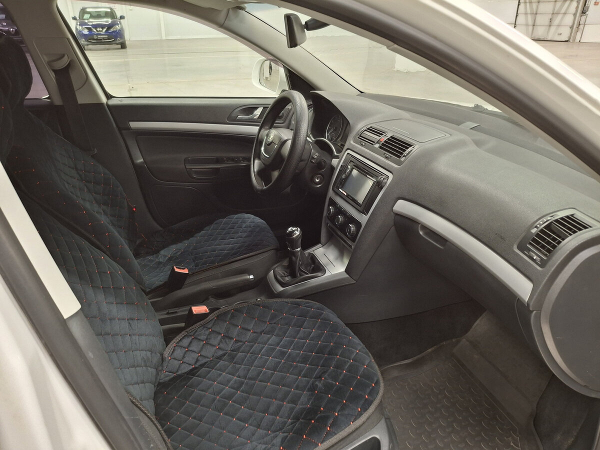 Skoda Octavia с пробегом — 2011 год. Фото: #10