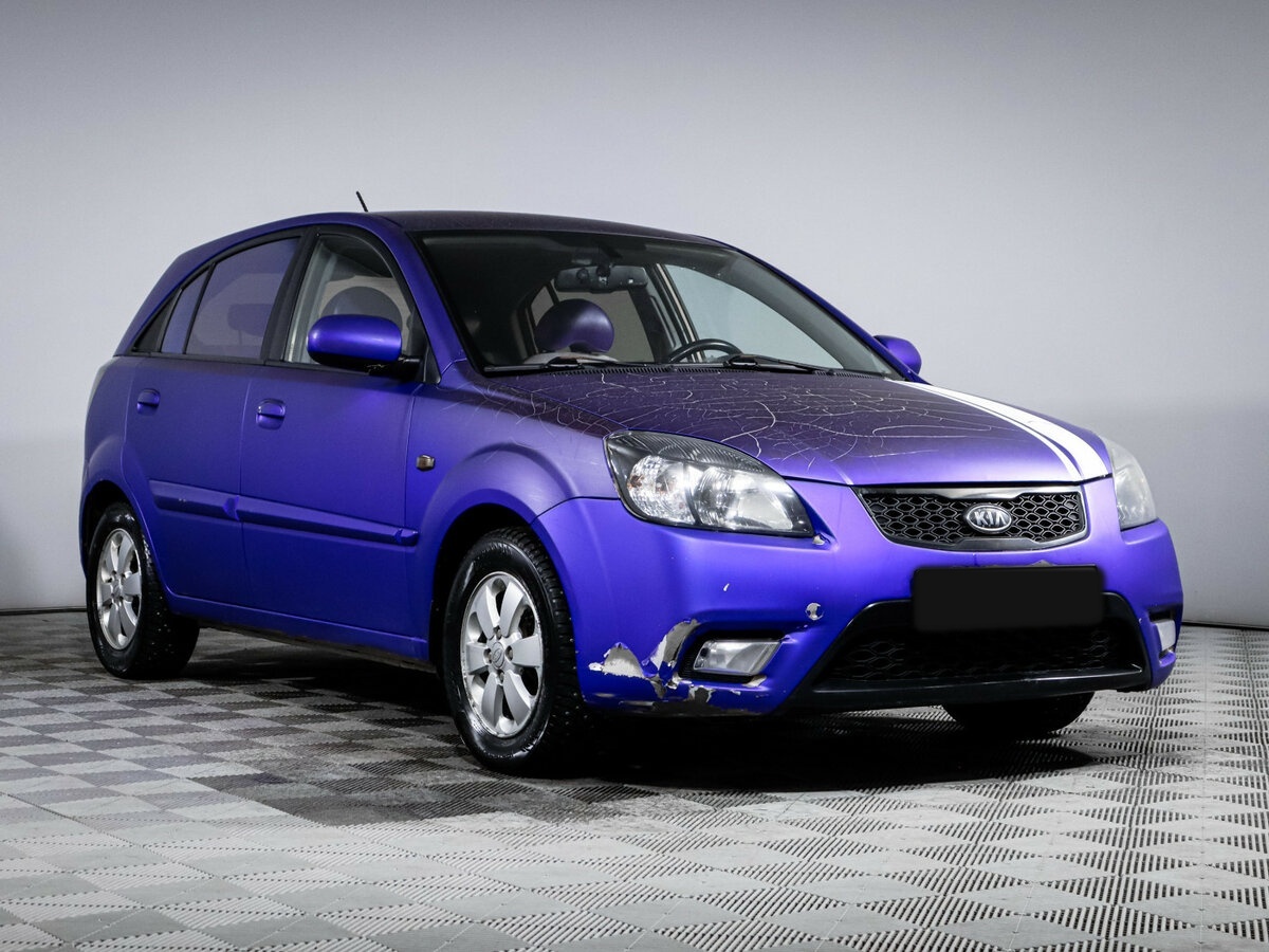 Kia Rio с пробегом — 2011 год. Фото: #2