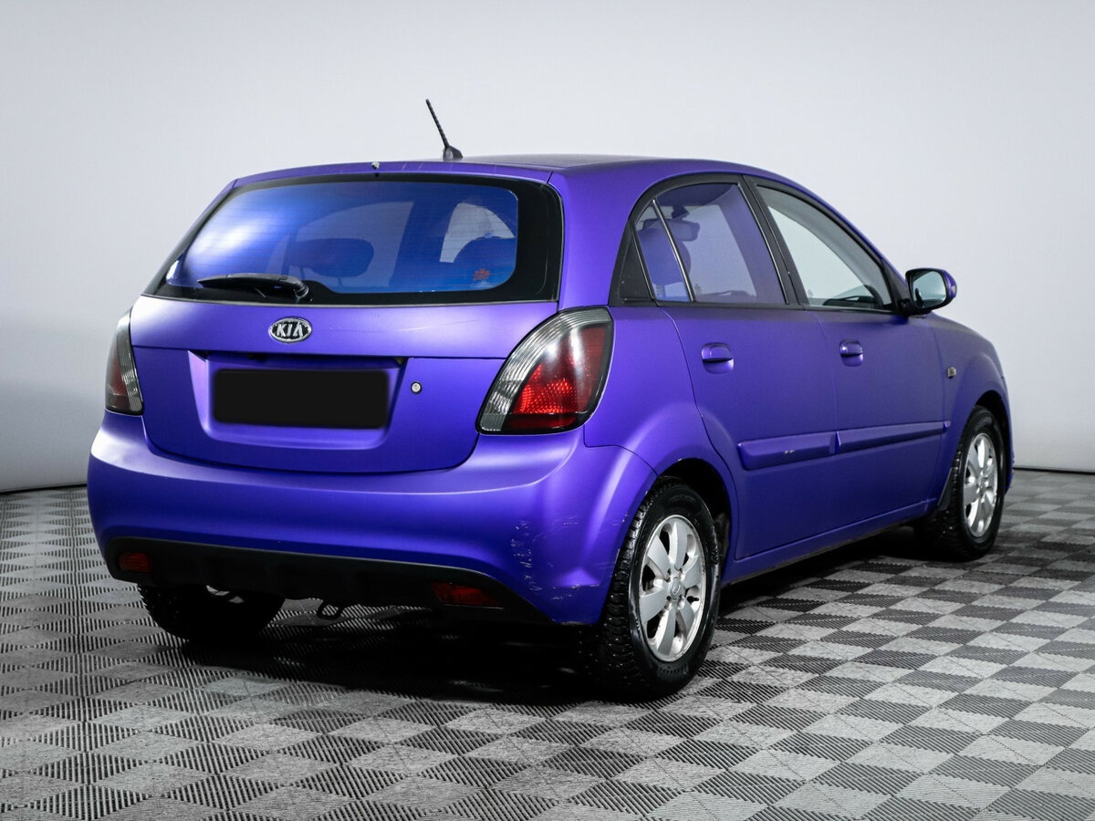 Kia Rio с пробегом — 2011 год. Фото: #3