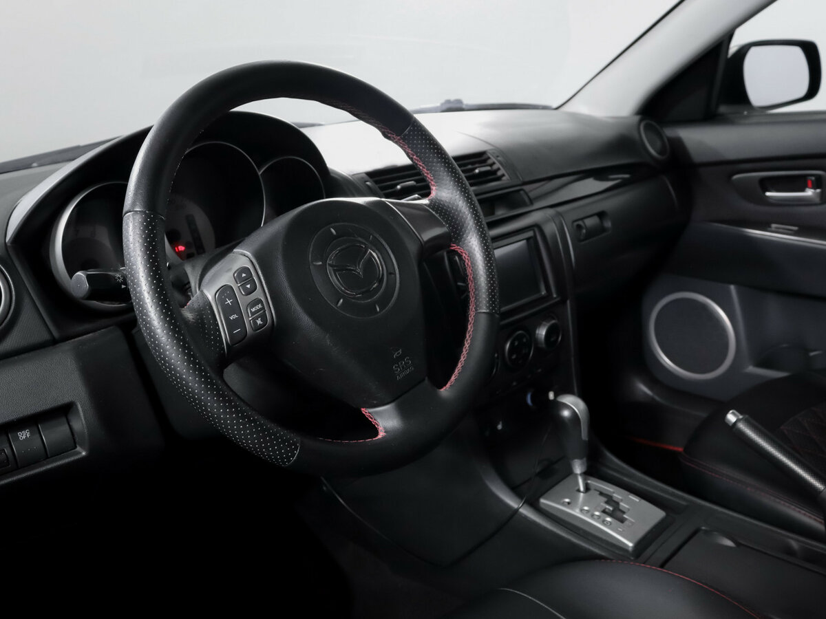 Mazda 3 с пробегом — 2007 год. Фото: #11