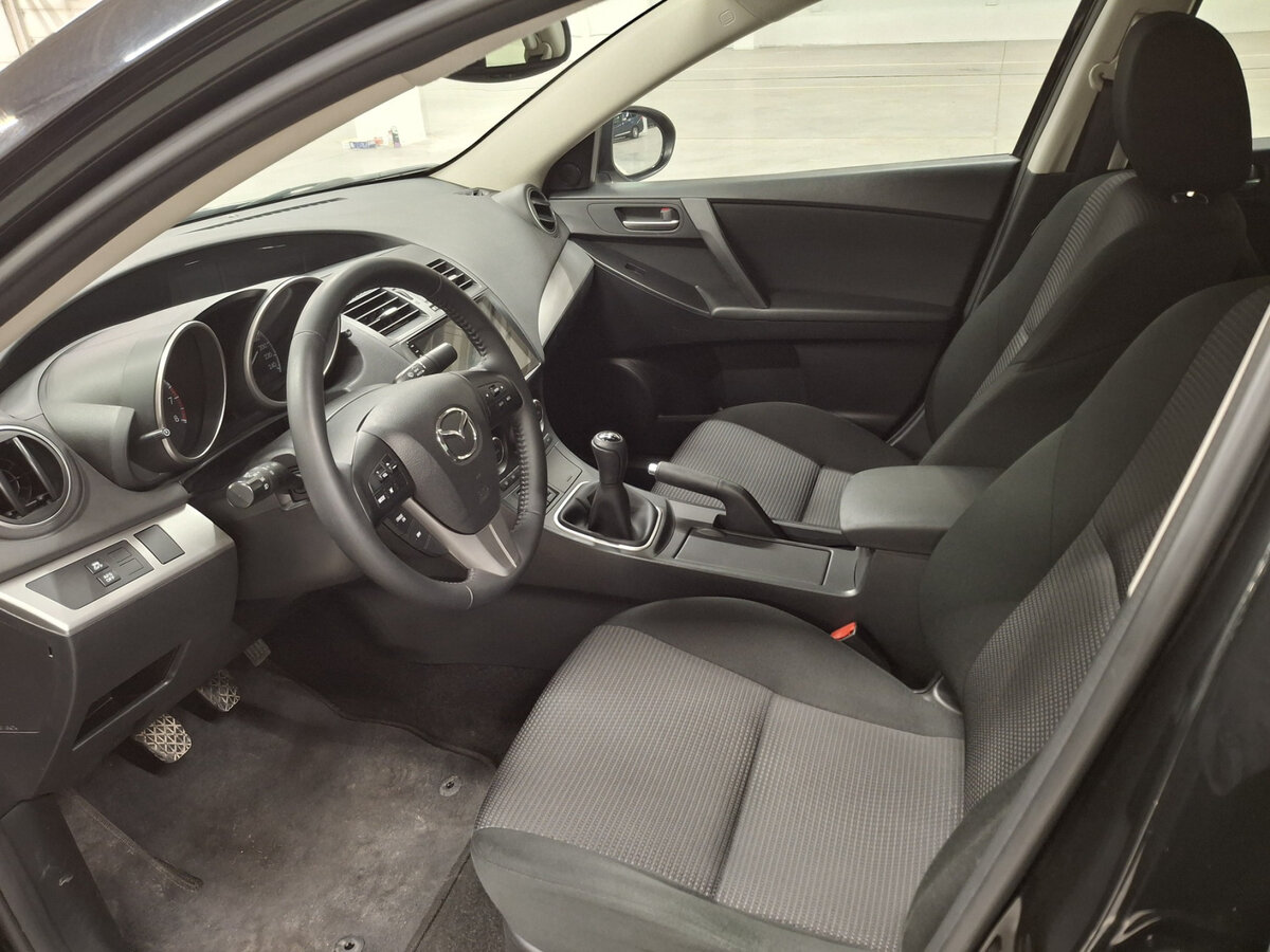 Mazda 3 с пробегом — 2013 год. Фото: #15
