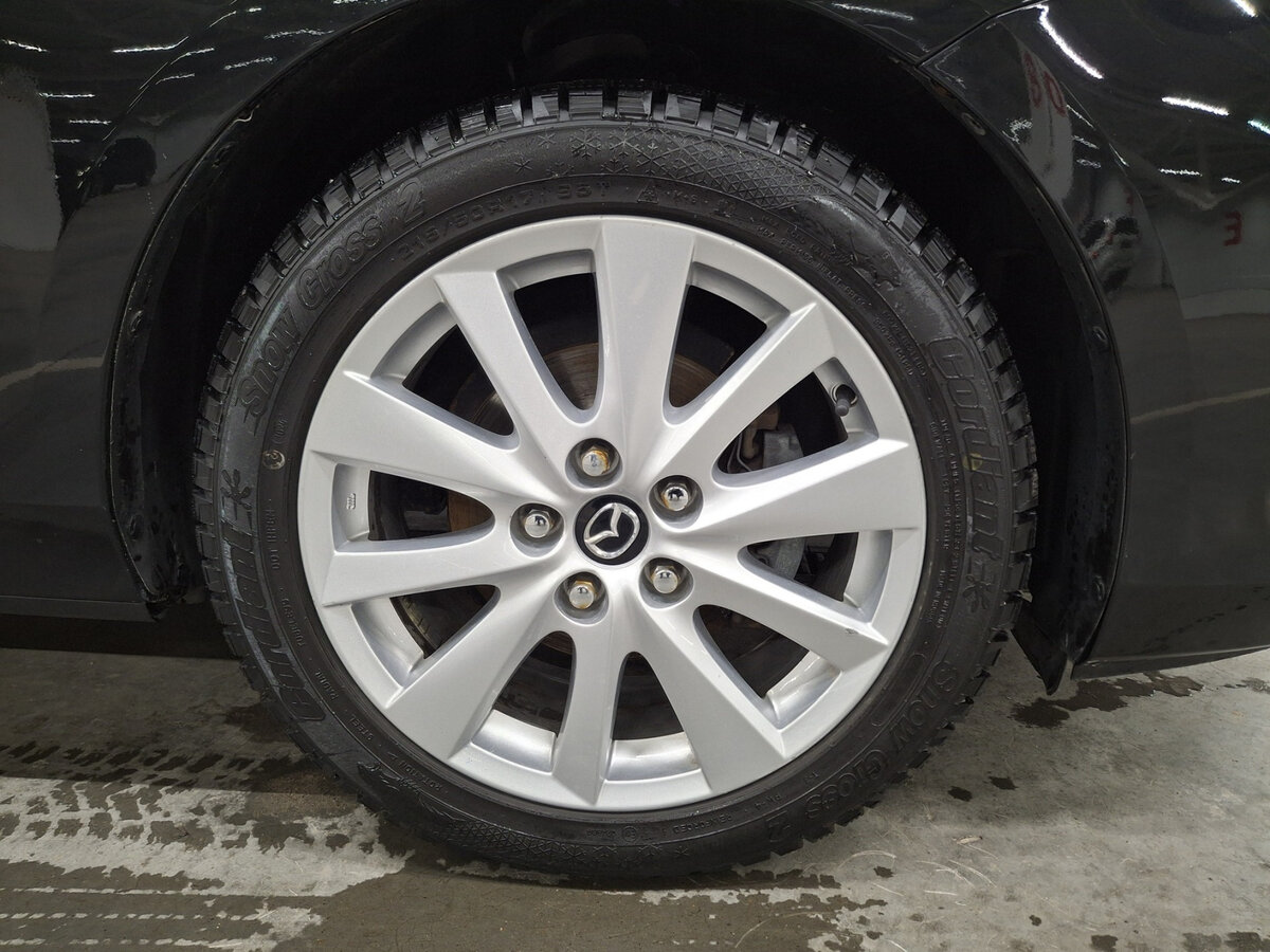 Mazda 3 с пробегом — 2013 год. Фото: #17