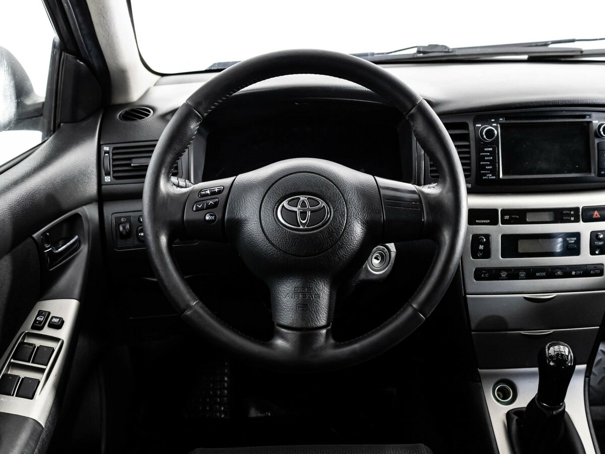 Toyota Corolla с пробегом — 2006 год. Фото: #8