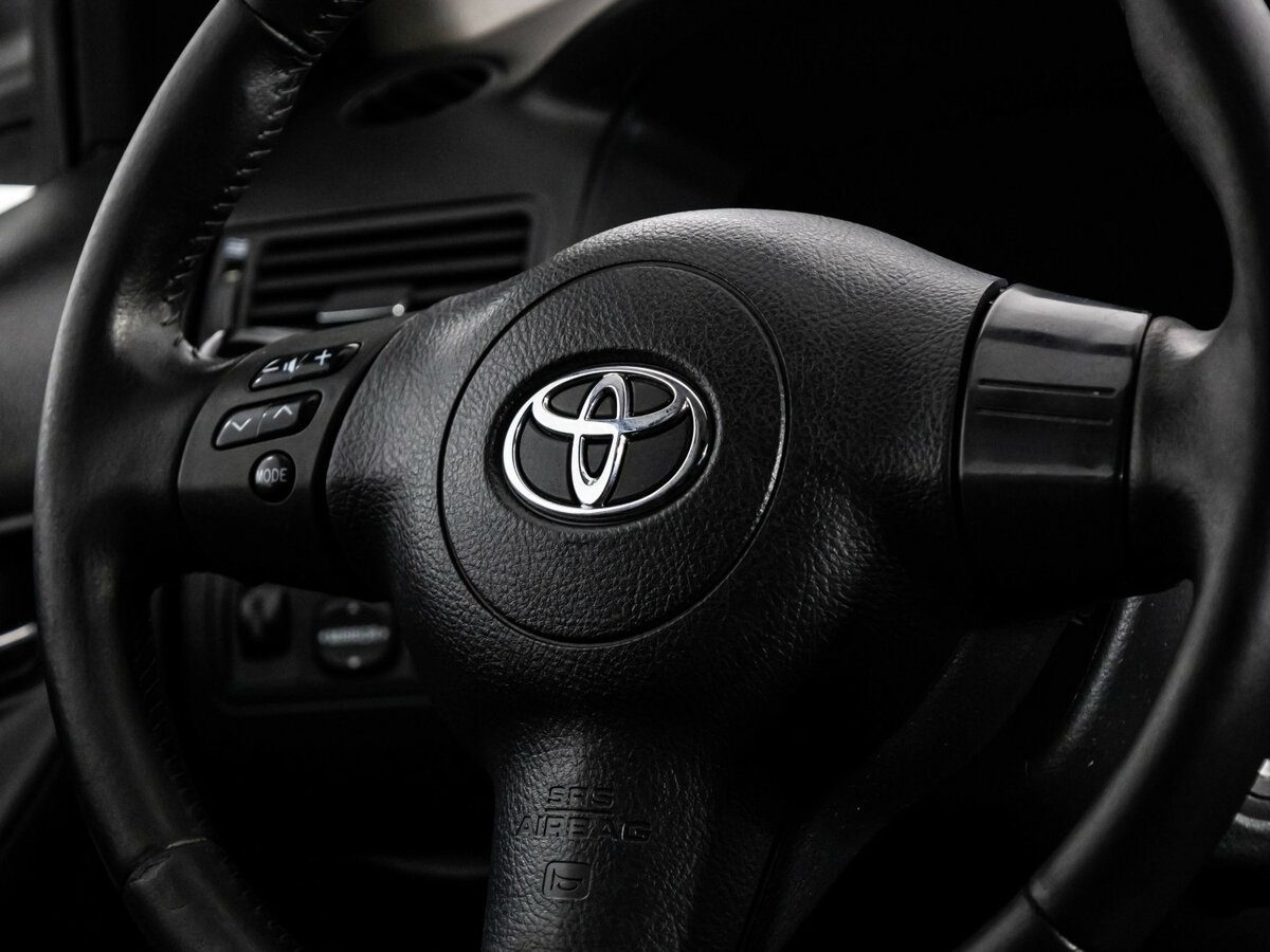 Toyota Corolla с пробегом — 2006 год. Фото: #9